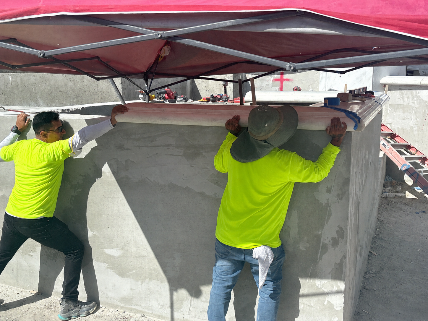 Field documentation of marble and stone construction work managed by Eduardo Munoz Perez JR